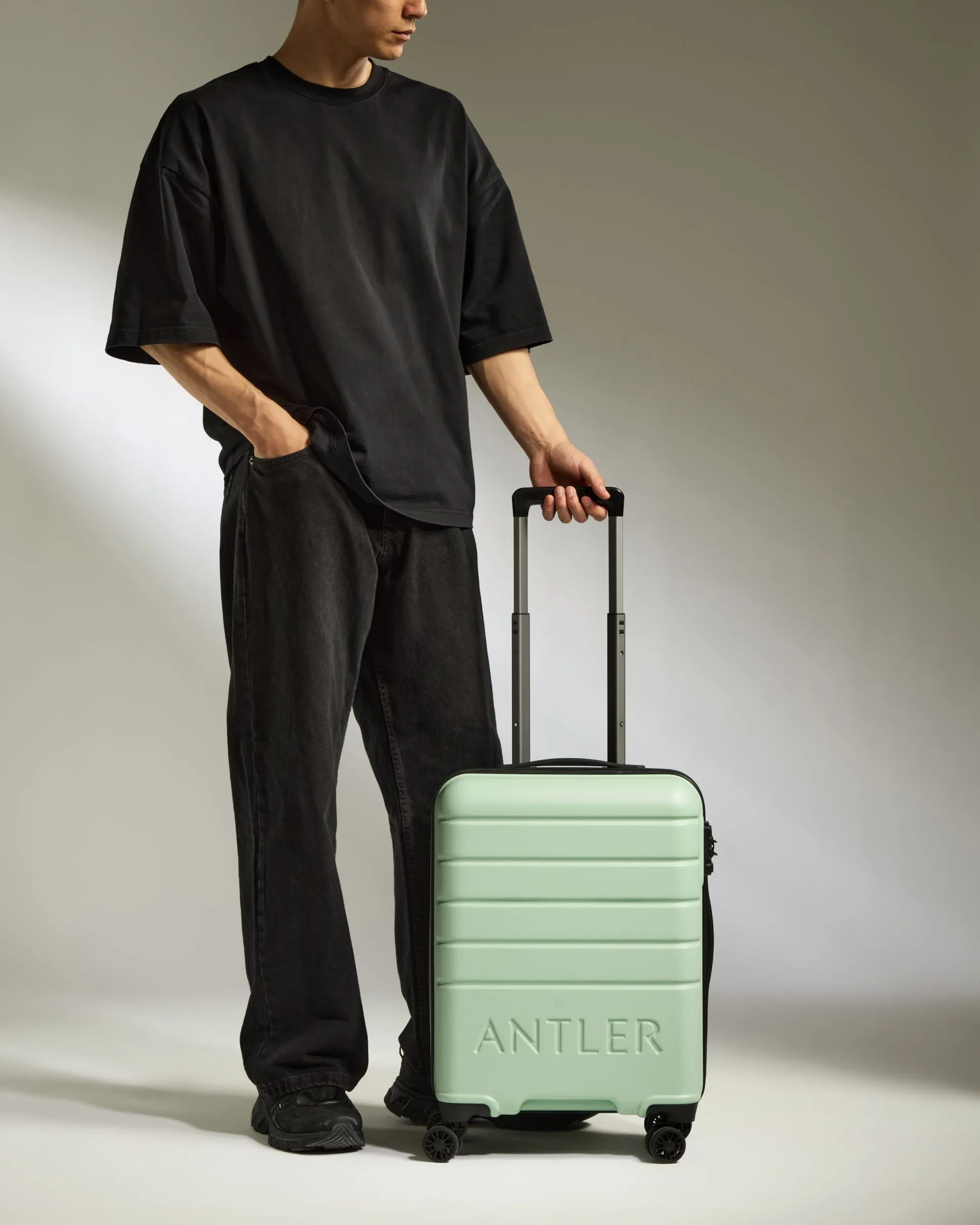 Cabin Suitcase in Aspen Green - Logo