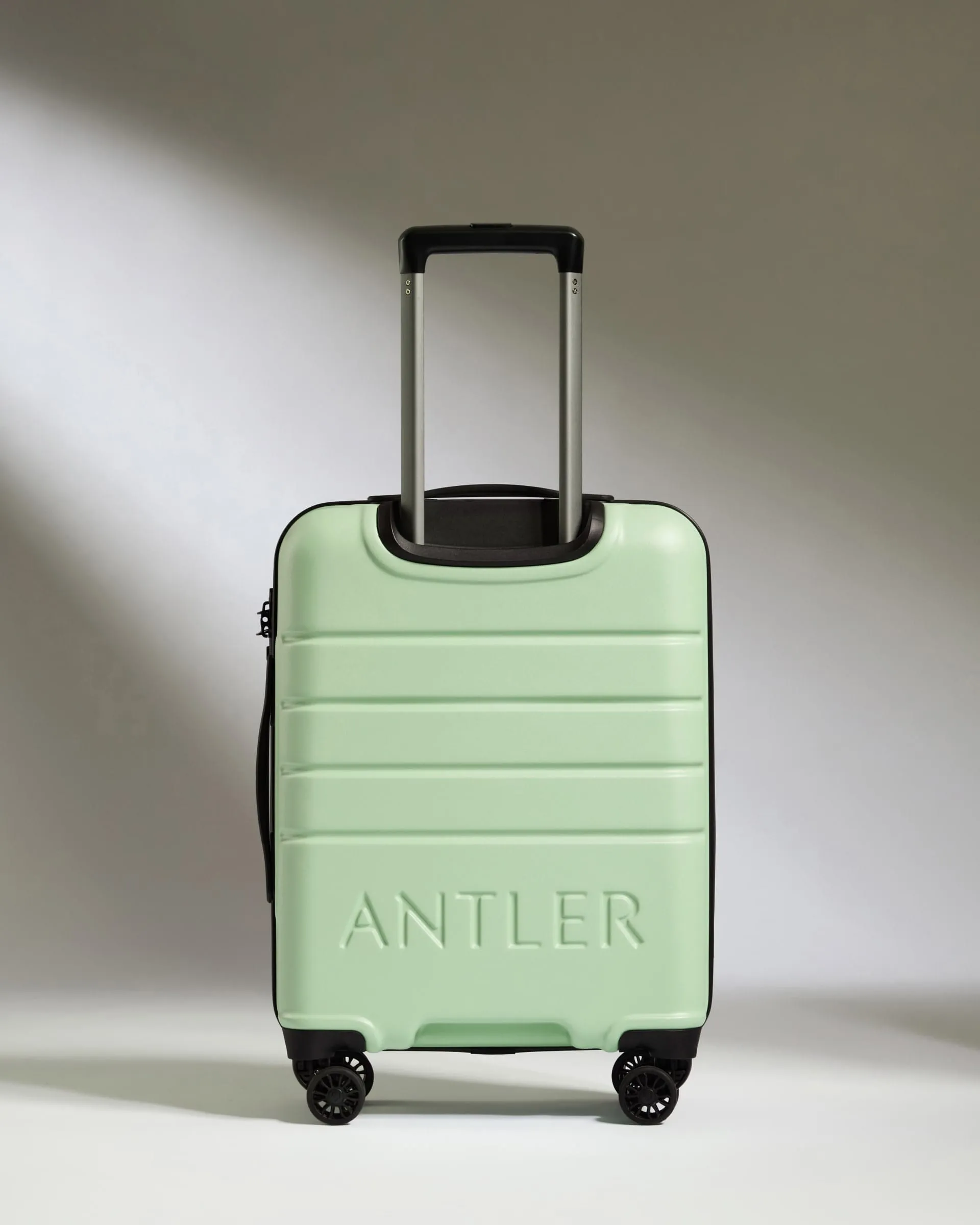 Cabin Suitcase in Aspen Green - Logo